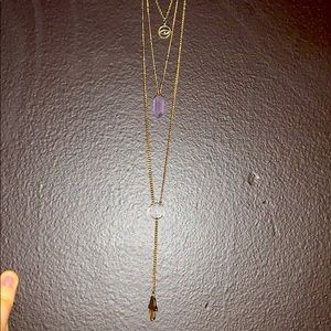 Triple gold necklace.